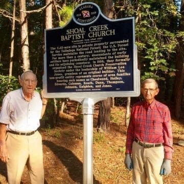 Brothers Joe and Houston Jones erecting a historical marker in 2017 commissioned by the Alabama Historical Association.